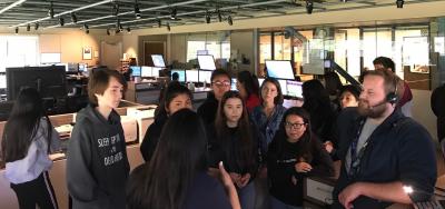 Dispatchers talking to high school students about 9-1-1